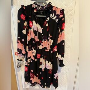 Super stylish dress, long sleeves and great for work wear or going out